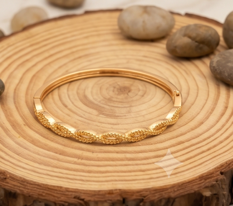 Twisted Gold Bypass Bangle with Pavé Circles