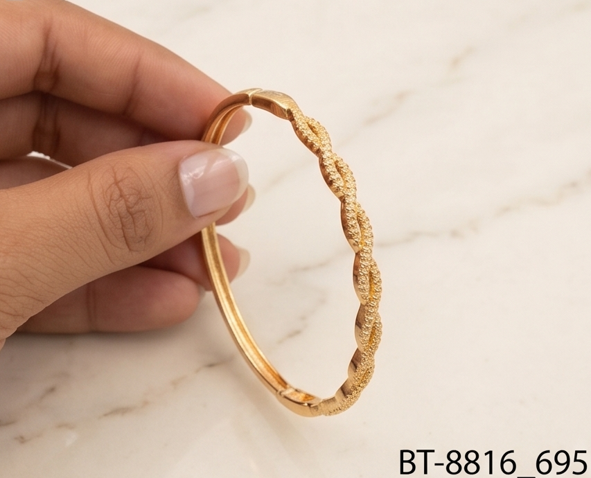 Twisted Gold Bypass Bangle with Pavé Circles